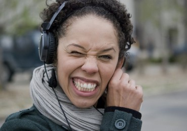 woman-headphones-confused.jpg