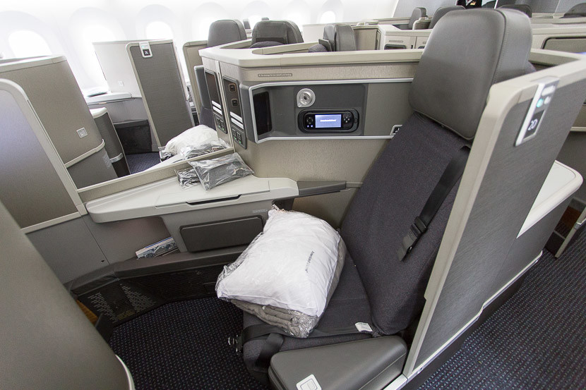 Forward-facing seats are open to the aisle and have a movable armrest on the aisle side. 