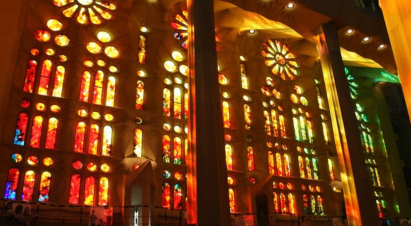 The sunlight streams through the stained glass windows at La Sagrada Família.