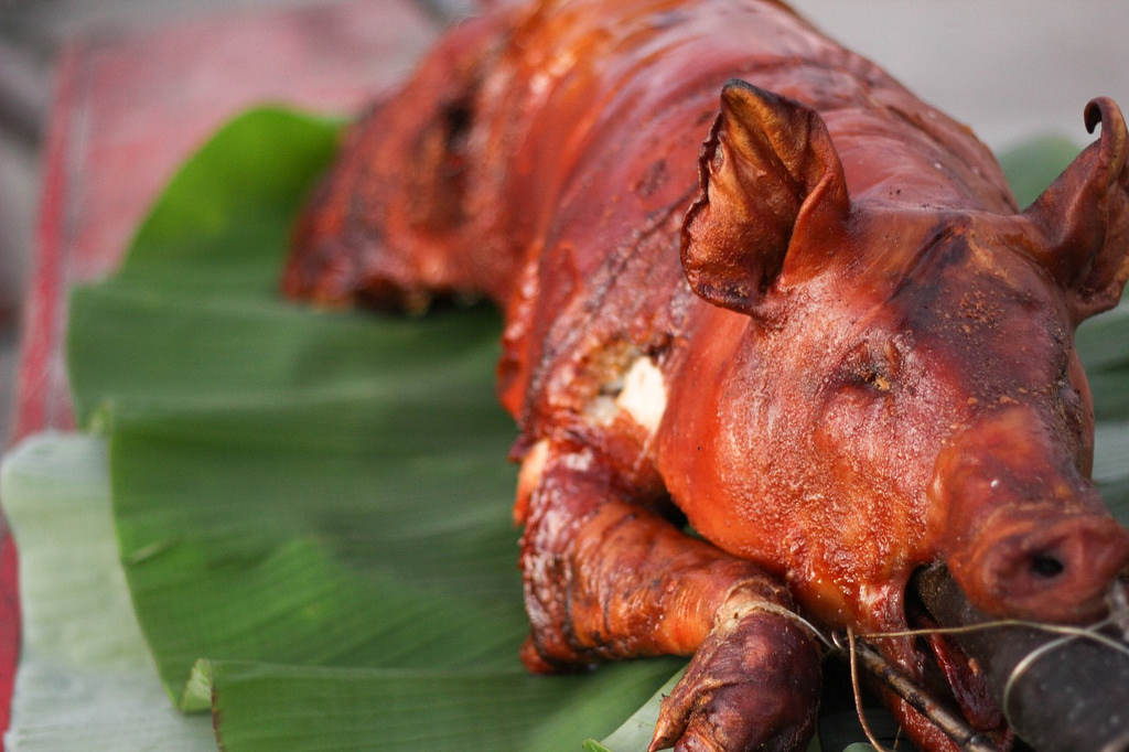 Roasted pig on spit is some of the most delicious things you'll eat in the Philippines. Pic: Cyria Gonzales/flickr