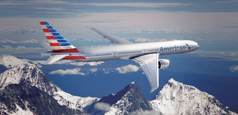 American Airlines plane over mountains.