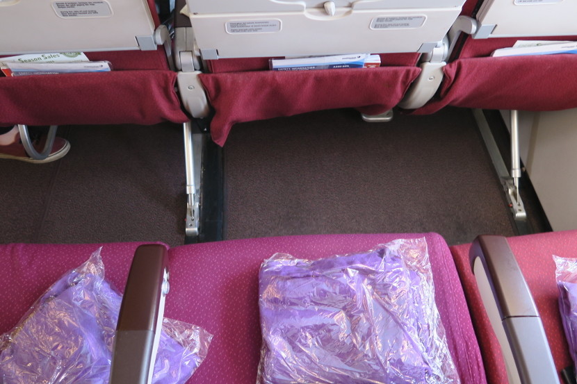 The seat structure and entertainment boxes did not impede legroom.