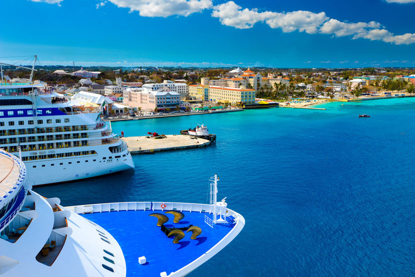 Cruise ships docked in Nassau, Bahamas. Image courtesy of Shutterstock.
