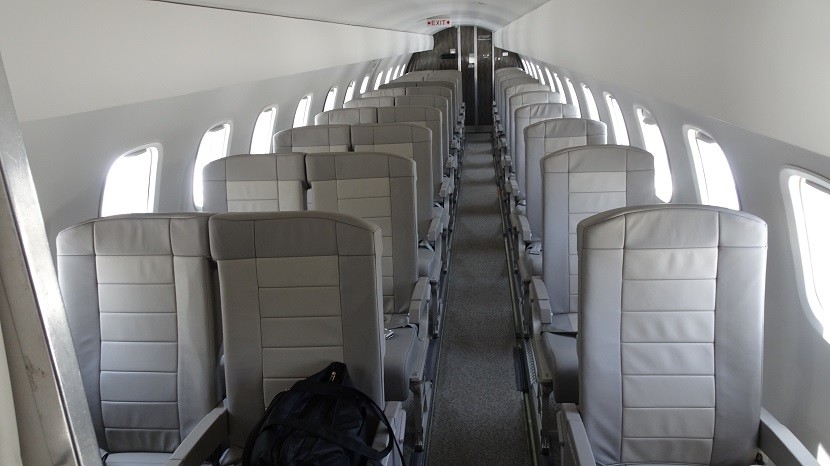 The Embraer E135 was configured with 30 leather seats in a 2x1 arrangement — and no overhead bins.