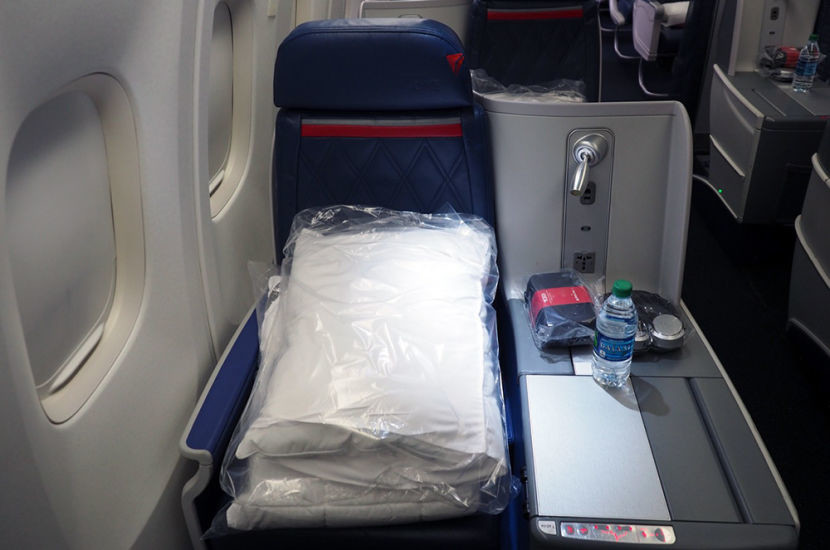 A seat when boarding in the Delta One cabin.