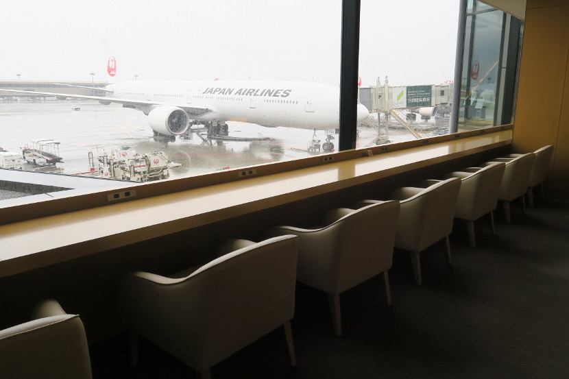 The Sakura lounge features many work and seating areas with views of the tarmac.