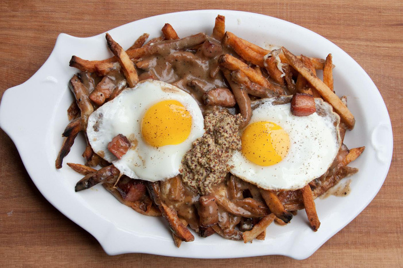 Animal Style Frites are a mainstay on the menu at Jonathan Sawyer's Greenhouse Tavern. Image courtesy of Greenhouse Tavern.
