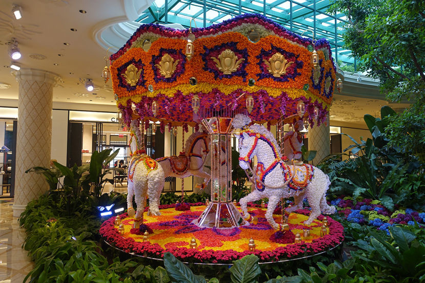 The flower-covered carousel brought some imagination to the property.