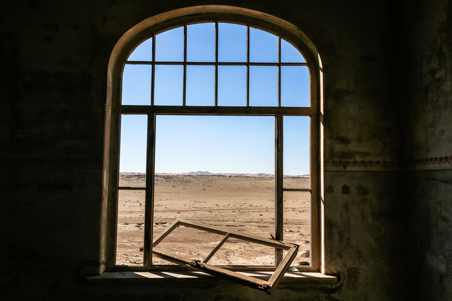 Kolmanskop’s houses are a part of the surrounding desert