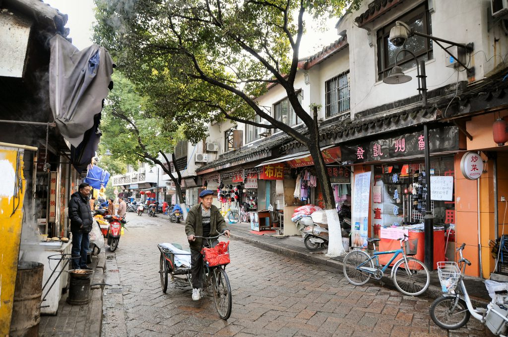 Man cycling in Suzhou City China