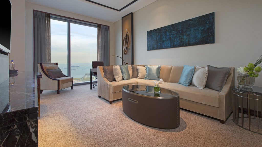 Bask in the spacious living room in the Sea View Suite