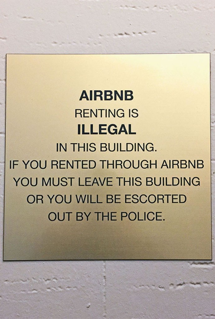 Signs such as this have been placed in residential buildings in Manhattan.
