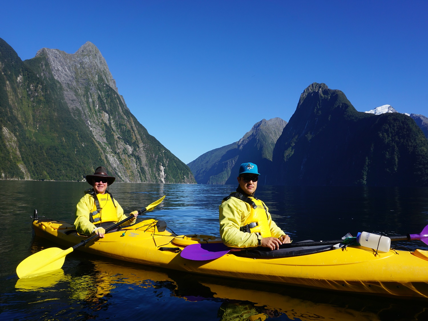kayakers taking a break on Milford Sound