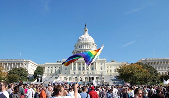 A Pride flag waving at a celebration in America