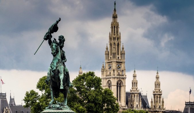 A statue and cathedral in Vienna