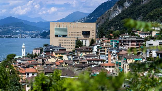 A picture taken on July 23, 2017 shows the casino of Campione d'Italia, an Italian enclave surrounded by the Swiss canton of Ticino on the edge of lake Lugano. / AFP PHOTO / Fabrice COFFRINI        (Photo credit should read FABRICE COFFRINI/AFP via Getty Images)